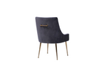 Como chair in dark charcoal with tall wingback, brass-toned legs, and front bar