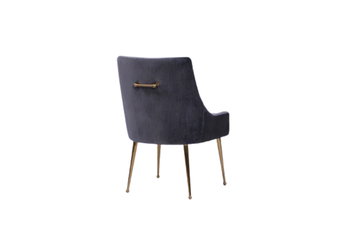 Como chair in dark charcoal with tall wingback, brass-toned legs, and front bar