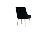 Black upholstered accent chair with brass bar detail on the back and metal legs