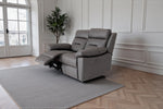 2-seater gray recliner sofa with extended footrest and padded armrests