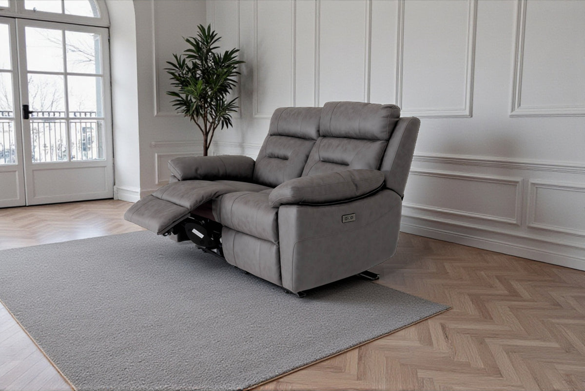 2-seater gray recliner sofa with extended footrest and padded armrests