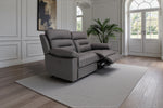 3-seat recliner sofa with dark gray reclining seats and extended footrests