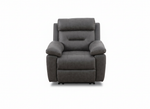 Electric recliner armchair in dark gray fabric, padded headrest and arms.