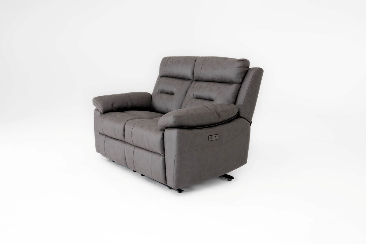 2-seater recliner sofa in gray fabric, side view with reclining back and arm detail