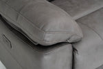 Grey recliner sofa seat with lever control on the side panel