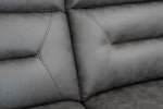 Grey sectional side panel with curved arm and stitched cushion edges