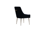 Black upholstered accent chair angled view with brass bar detail and slim metal legs