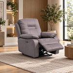 Gray electric recliner armchair with extended footrest and padded armrests