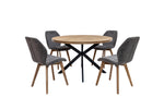 Round oak veneer dining table with black X base and four upholstered chairs