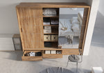 Sliding wardrobe with wood-look panels and mirror doors, open storage compartments.