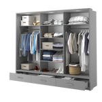 Open dark gray wardrobe interior with shelves, hanging rails, and drawer storage.