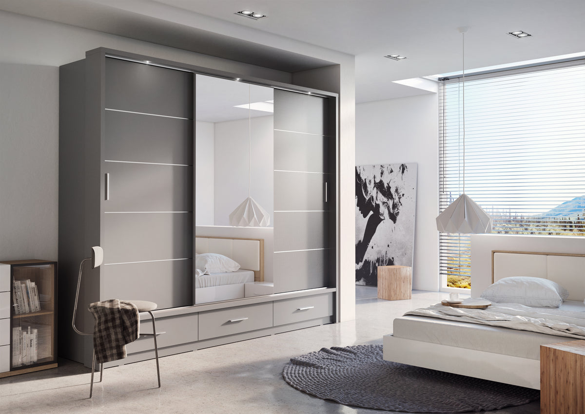 Sliding door wardrobe with dark gray panels, built-in shelves, and drawer base.