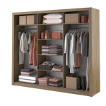 Sliding door wardrobe in wood finish with shelves, drawers, and hanging clothing rails