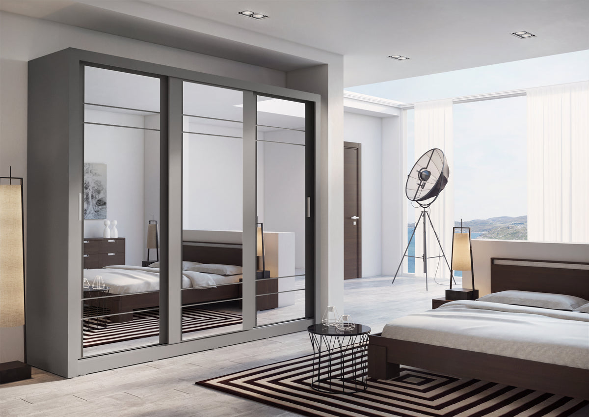 Sliding wardrobe with dark frames and mirrored sliding doors, storage compartments behind