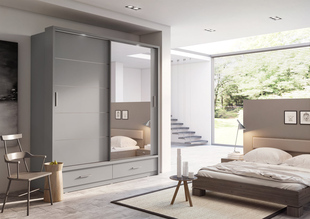 Light grey sliding door wardrobe with lower drawers and open shelving inside