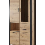 Double display cabinet with light oak panels, black frame, glass display and 3 drawers