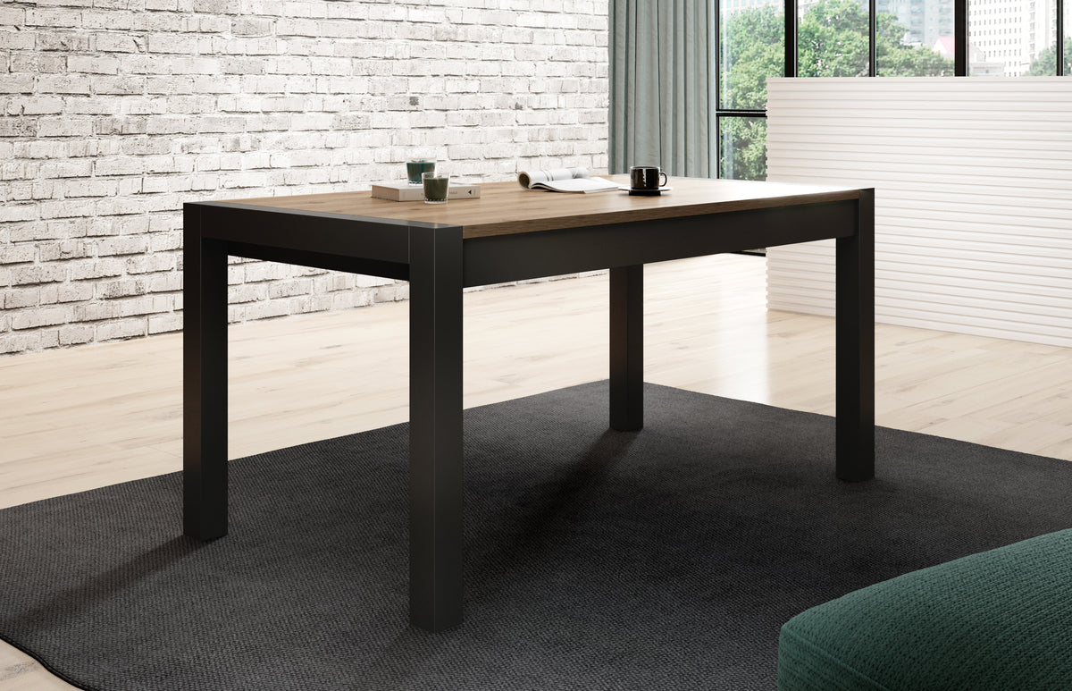 Extendable dining table with light wood top and dark legs