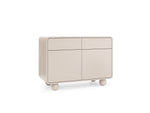 Beige sideboard with top drawers and two-panel doors, rounded corners and feet