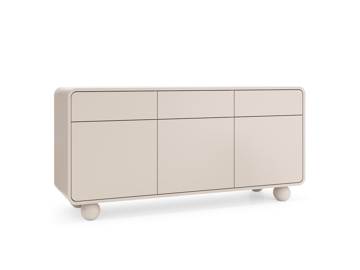 Beige sideboard with three drawers and three cabinet doors, rounded legs