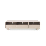 Low TV cabinet with three open compartments and sliding doors, light beige finish