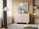 Beige sideboard with 2 drawers and 2 doors, curved trim and round feet