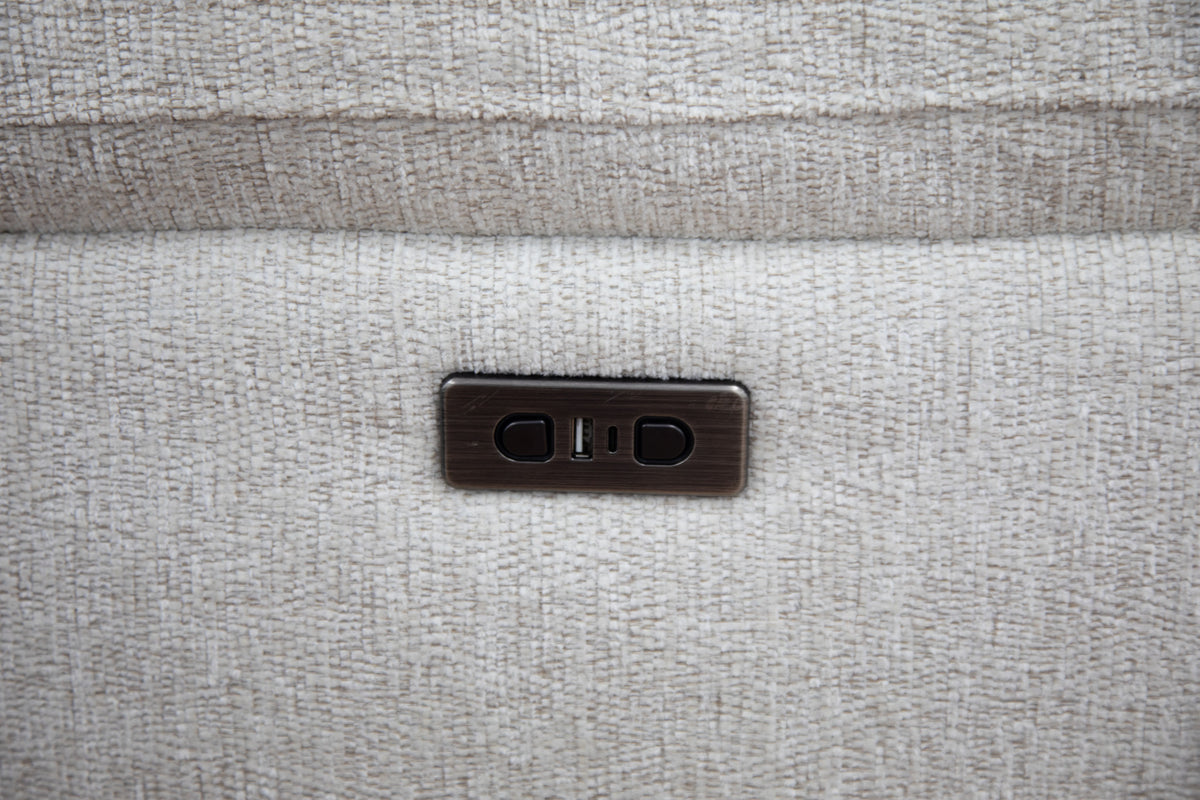 Grey fabric electric recliner sofa control panel on the seat