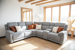 Grey electric recliner corner sofa with multiple seat sections and cushions