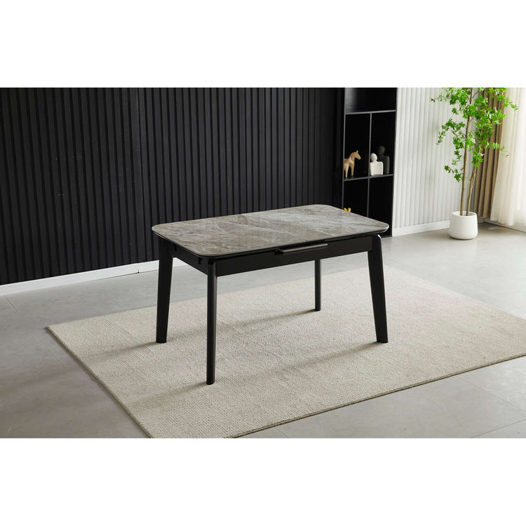 Extendable dining table with light grey ceramic stone-effect top and dark legs