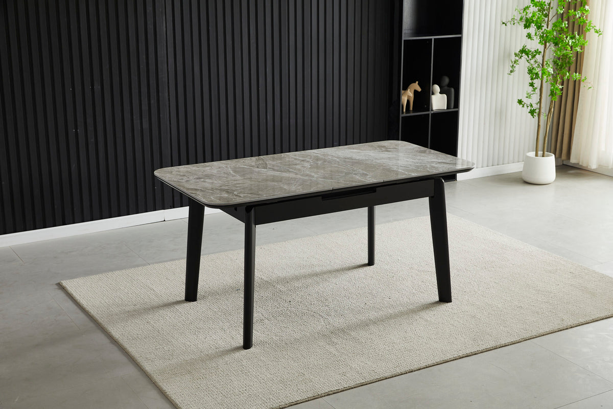 Extendable dining table with grey ceramic stone-effect top and dark frame