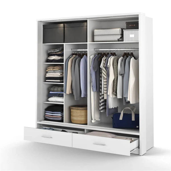 White sliding door wardrobe with hanging clothes, shelves, and two drawers