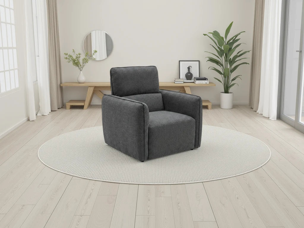 Charcoal upholstered armchair with square arms and padded backrest
