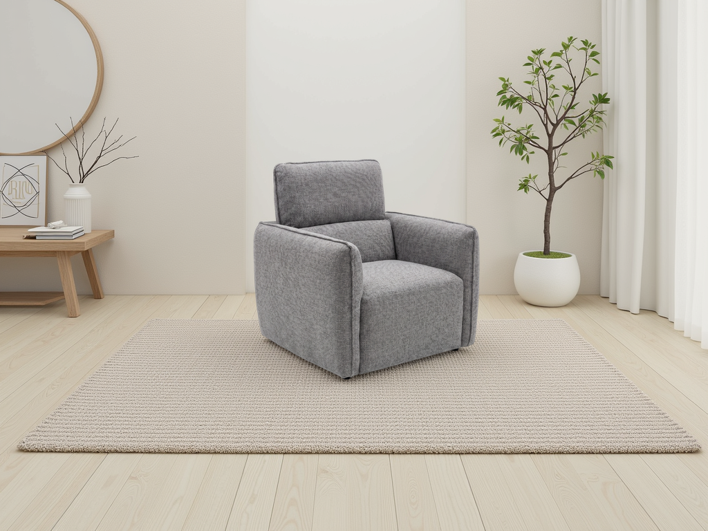 Grey upholstered armchair with padded backrest, square arms, and wide seat