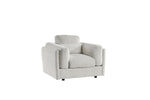 Upholstered armchair in light gray with square arms and boxy seat cushions