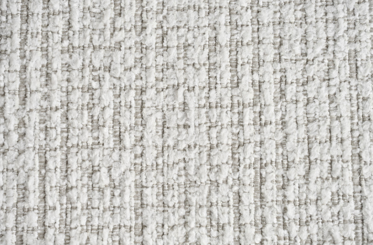 Light grey textured fabric upholstery close-up with woven pattern