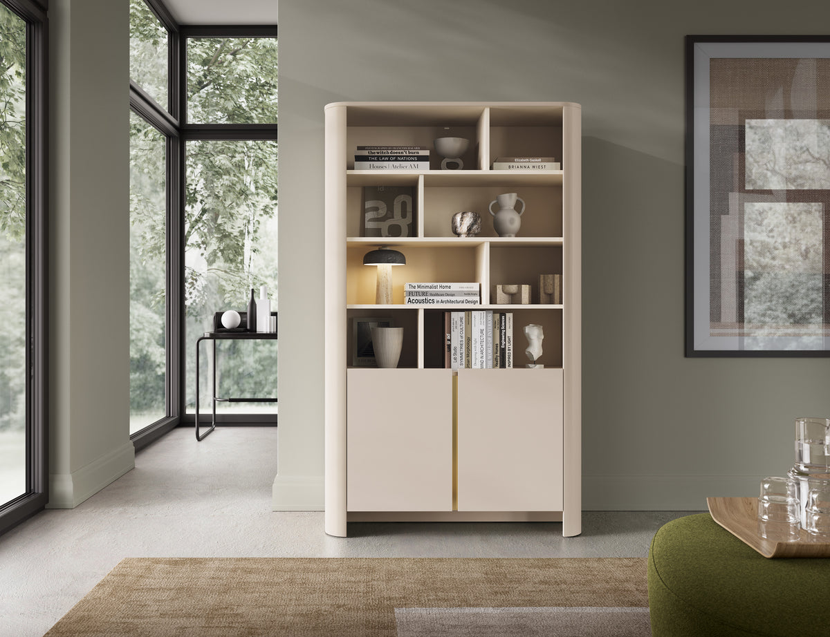 Gray bookcase with open shelving top and two doors at the bottom.