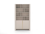 Gray bookcase with open cubby shelves and two panel doors.