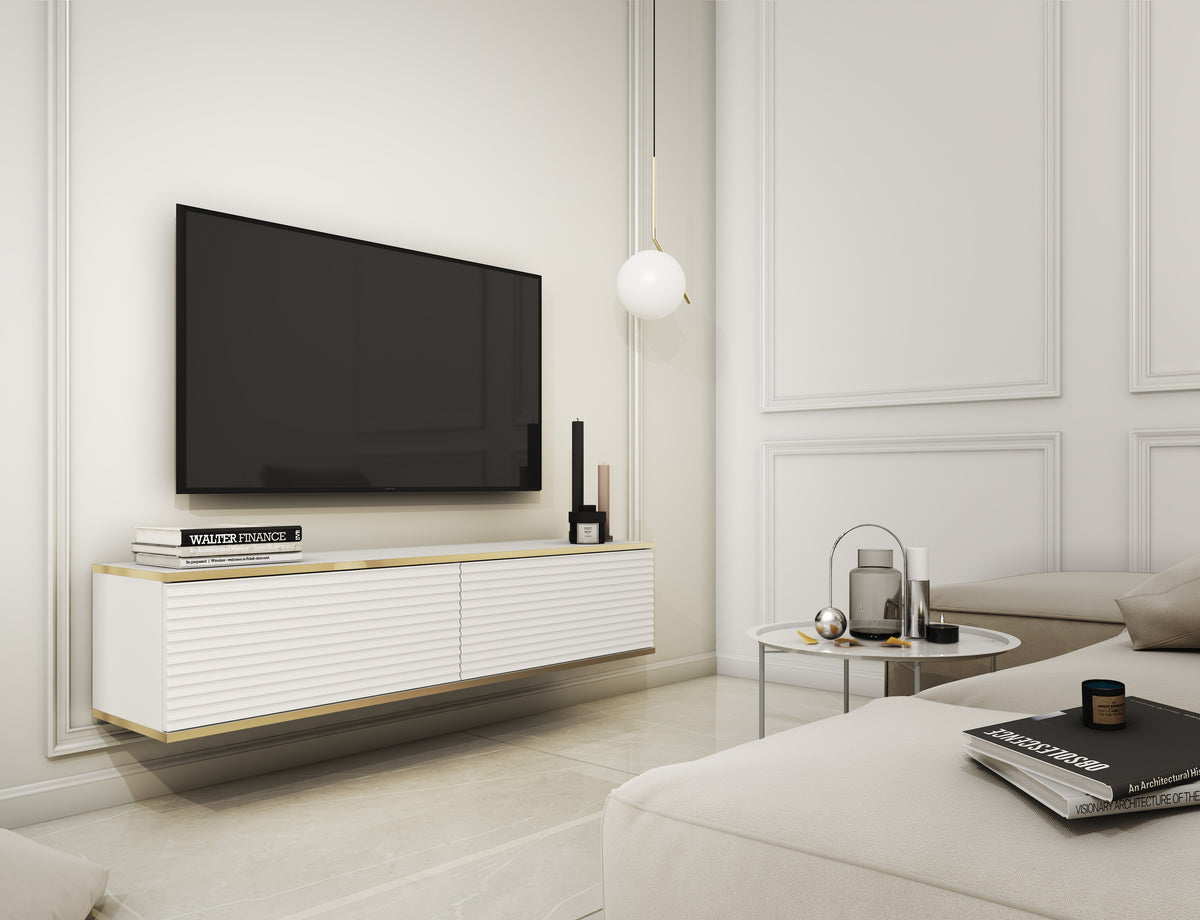 White TV cabinet with ribbed double doors and gold trim, low console