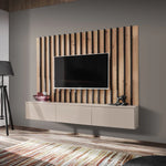 Front view media wall unit with wood slat panel, black TV, and white storage drawers