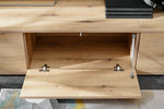 Open tabletop compartment inside wall unit with light wood interior and metal brackets