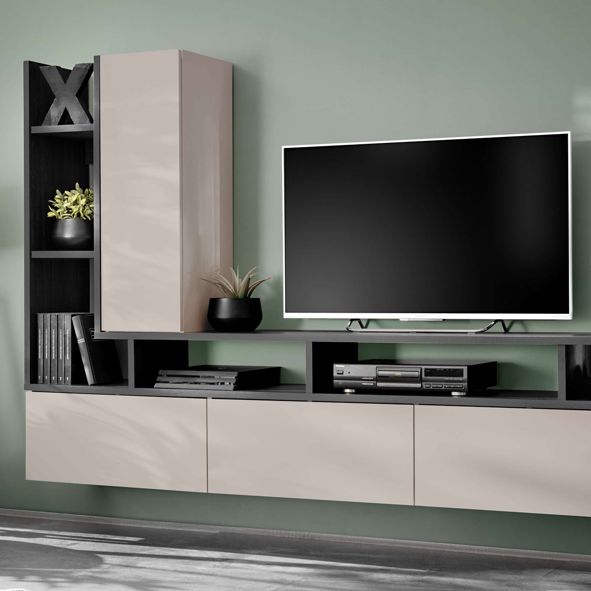 Media wall unit with flat-screen TV, side cabinets, and central drawers in dark wood