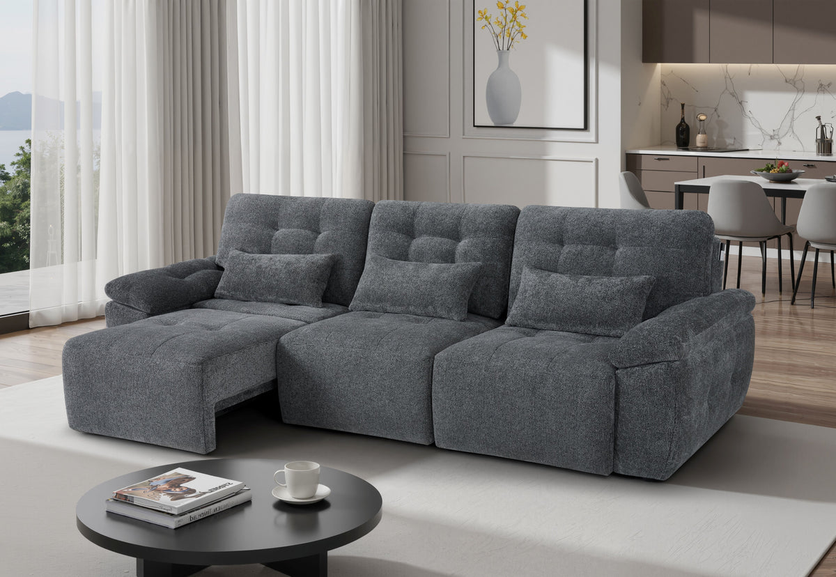 Grey 3-seater sofabed with tufted back, extended chaise, padded headrest cushions