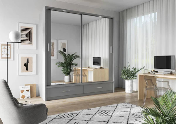 White sliding door wardrobe with mirrored panels and two drawers