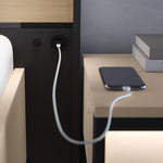 Ottoman bed side panel with power port and charging cable connection