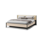Ottoman bed frame with beige upholstered base, gray bedding, and striped headboard