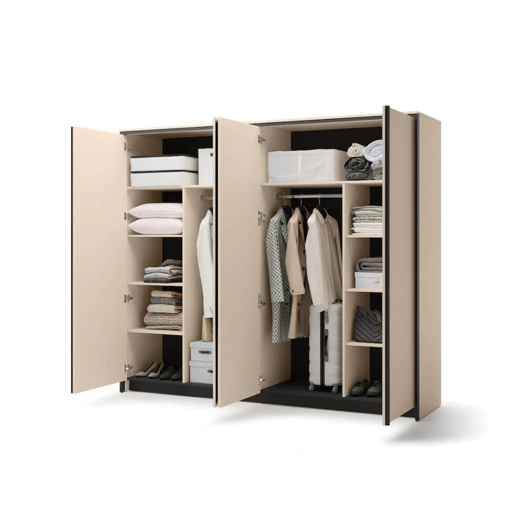 Beige wardrobe with sliding doors open, interior shelves holding folded clothes