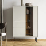 Light grey cabinet front with partial glass door showing shelves and decor inside