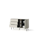 Light gray sideboard with drawers and open shelves holding folded textiles