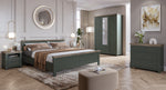 Small chest of drawers with dark green body and wooden top for bedroom storage