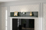 Wall-mounted dark green shelf with small decor and candles