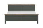 Dark teal bed frame with paneled headboard, low footboard, and front drawers